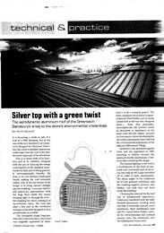 Silver top with a green twist. Aerodynamic aluminium roof at Sainsbury's Greenwich. AJ 16/23.12.99