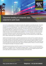 Transverse bending of composite slabs subjected to point loads